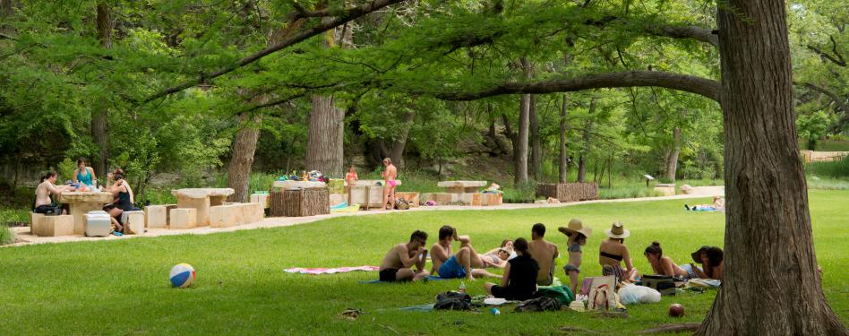 Group of people sitting in a park