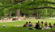 Group of people sitting in a park