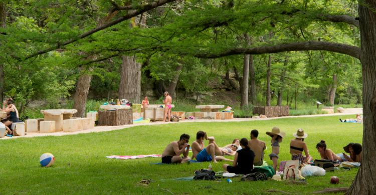 Group of people sitting in a park